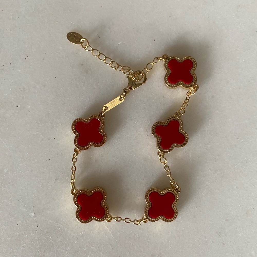 Elegant Gold and Red Clover Bracelet